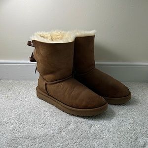 Brown size 7 UGGs with bows on the back